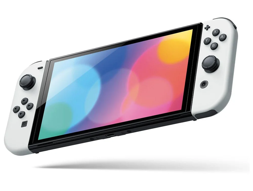 Nintendo Switch OLED 64GB 2 Controles Joy-Con Branco e Preto com Super Mario Bros. Wonder e 3 Meses de Nintendo Switch Online Nintendo Switch OLED 64GB 2 Controles Joy-Con Branco e Preto com Super Mario Bros. Wonder e 3 Meses de Nintendo Switch Online