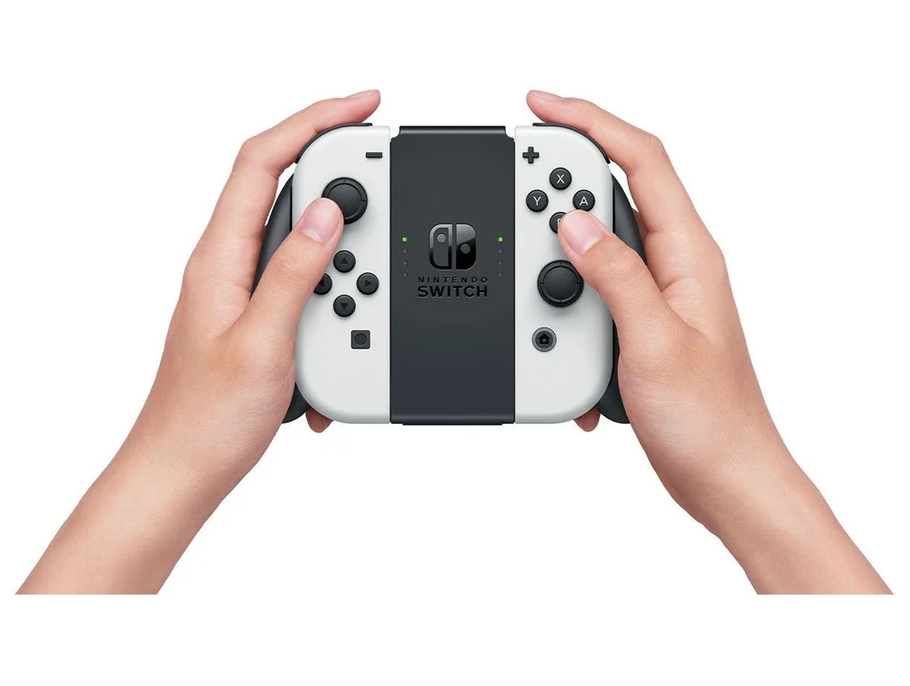 Nintendo Switch OLED 64GB 2 Controles Joy-Con Branco e Preto com Super Mario Bros. Wonder e 3 Meses de Nintendo Switch Online Nintendo Switch OLED 64GB 2 Controles Joy-Con Branco e Preto com Super Mario Bros. Wonder e 3 Meses de Nintendo Switch Online